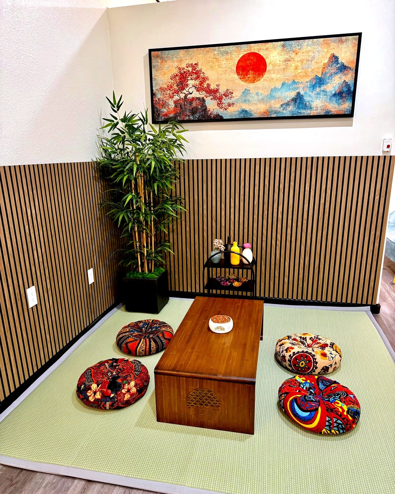 Japanese-inspired tea room seating area within the studio