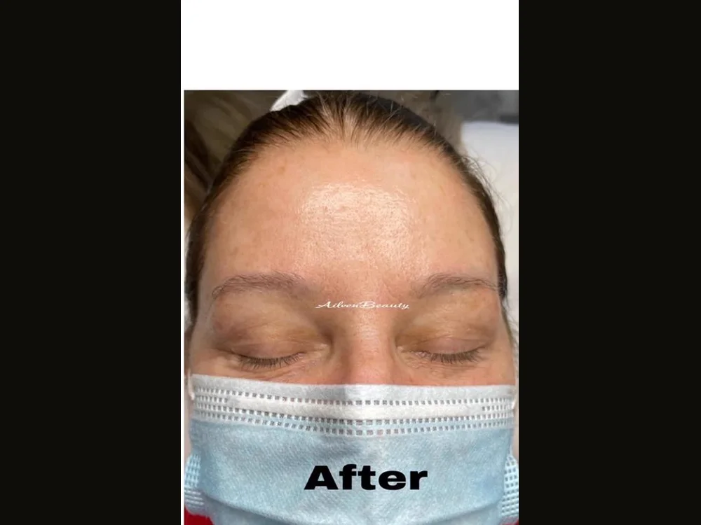 Faded cool-toned brow tattoo — After · front (real client, unretouched)
