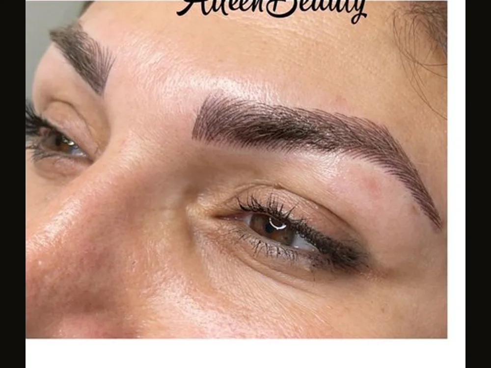The same client after non-laser eyebrow tattoo removal at Aileen's Beauty — ashy / uneven pigment visibly lifted
